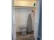 Convenient laundry room with shelving and ironing board at 2658 48Th S St, Gulfport, FL 33711