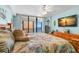Main bedroom with large bed and stunning ocean view at 14900 Gulf Blvd # 410, Madeira Beach, FL 33708