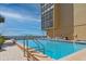 Inviting community pool with ocean views at 14900 Gulf Blvd # 410, Madeira Beach, FL 33708