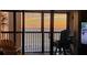 Stunning sunset view from condo balcony overlooking the ocean at 14900 Gulf Blvd # 410, Madeira Beach, FL 33708