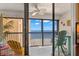 Enjoy ocean views from this screened balcony with seating at 14900 Gulf Blvd # 410, Madeira Beach, FL 33708
