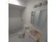 Modern bathroom with tiled walk-in shower, updated vanity, and neutral decor at 3102 W Leroy St # A, Tampa, FL 33607