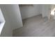 Bedroom featuring light colored wood flooring and bright white walls at 3102 W Leroy St # A, Tampa, FL 33607