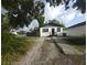 Charming single-story home with a well-maintained front yard and fence at 3102 W Leroy St # A, Tampa, FL 33607