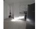 Bright kitchen with white cabinets, modern appliances, and lots of natural light at 3102 W Leroy St # A, Tampa, FL 33607