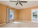 Relaxing bedroom featuring a sliding glass door to the patio at 8817 Crystal Creek Ct, Land O Lakes, FL 34638