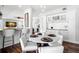 Breakfast nook with white round table and chairs, built in cabinetry at 4915 Augusta Ave, Oldsmar, FL 34677