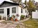 Cozy house with a walkway and potted plants at 3102 W Leroy St # A, Tampa, FL 33607