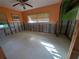 A bedroom under renovation with new flooring and walls at 501 Crystal Dr, Madeira Beach, FL 33708