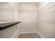Spacious walk-in closet with wire shelving provides ample storage at 5000 Culbreath Key Way # 1-203, Tampa, FL 33611