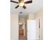 Bright bedroom with ceiling fan, access to bathroom and another room at 5000 Culbreath Key Way # 1-203, Tampa, FL 33611