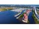 Aerial showing community, canal, and neighboring properties at 5000 Culbreath Key Way # 1-203, Tampa, FL 33611