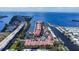 Aerial view of community, waterfront, and bridge at 5000 Culbreath Key Way # 1-203, Tampa, FL 33611