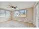 Bright dining area with tile floors and ceiling fan at 3525 Umber Rd, Holiday, FL 34691