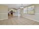 Dining area with a view into the updated kitchen at 3525 Umber Rd, Holiday, FL 34691