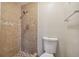 Clean bathroom with shower and toilet at 3525 Umber Rd, Holiday, FL 34691