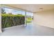 Covered entryway with a view of a residential street beyond at 3525 Umber Rd, Holiday, FL 34691