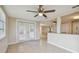 Dining area with view into living room and kitchen at 3525 Umber Rd, Holiday, FL 34691