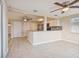 Open dining area with kitchen and living room views at 3525 Umber Rd, Holiday, FL 34691