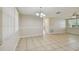 Spacious dining room featuring tile floors and natural light at 3525 Umber Rd, Holiday, FL 34691