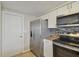 Modern kitchen with stainless steel appliances and granite countertops at 3525 Umber Rd, Holiday, FL 34691