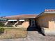 Front entrance with a walkway and landscaping at 11365 5Th E St, Treasure Island, FL 33706