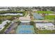 Aerial view of tennis courts near waterfront community at 3825 Pompano Se Dr, St Petersburg, FL 33705
