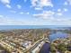 Aerial view of waterfront community with lush landscaping and water access at 3825 Pompano Se Dr, St Petersburg, FL 33705