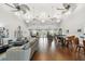 Bright and airy community room with seating and dining areas at 3825 Pompano Se Dr, St Petersburg, FL 33705