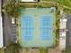 Aerial view of two well-maintained tennis courts at 3825 Pompano Se Dr, St Petersburg, FL 33705