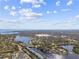 Aerial view showcasing waterfront community and surrounding area at 3825 Pompano Se Dr, St Petersburg, FL 33705