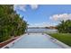 Scenic lake view is seen from this home's hot tub, providing a serene atmosphere at 805 Seminole Sky Dr, Ruskin, FL 33570