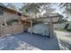 Carport with parking for one car and extra space at 1106 Lennox W Rd, Palm Harbor, FL 34683