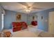 Multi-purpose room with a sofa, ceiling fan, and small dining table set at 1106 Lennox W Rd, Palm Harbor, FL 34683