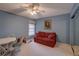 Room with a sofa, ceiling fan, and small dining table set at 1106 Lennox W Rd, Palm Harbor, FL 34683