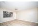 Spacious bedroom with ceiling fan and laminate wood flooring at 101 Lake Ne Ave # 211, Largo, FL 33771