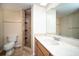 Bathroom with shower, toilet, and vanity at 101 Lake Ne Ave # 211, Largo, FL 33771
