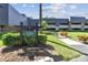 Killarney Lodge 9 building exterior with landscaping at 36750 Us Highway 19 N # 09110, Palm Harbor, FL 34684