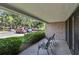 Brick patio with chairs and a view of the parking lot at 36750 Us Highway 19 N # 09110, Palm Harbor, FL 34684
