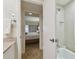 Bathroom with access to bedroom and bathtub at 36750 Us Highway 19 N # 09110, Palm Harbor, FL 34684