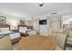 Comfortable bedroom with two double beds and a view of the dining area at 36750 Us Highway 19 N # 09110, Palm Harbor, FL 34684