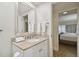 Bathroom with granite countertop and a large mirror at 36750 Us Highway 19 N # 09110, Palm Harbor, FL 34684