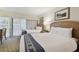 Two neatly made twin beds with blue accent pillows at 36750 Us Highway 19 N # 09110, Palm Harbor, FL 34684