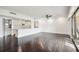 Open concept living area with hardwood floors and kitchen views at 36750 Us Highway 19 N # 04208, Palm Harbor, FL 34684