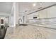 Modern kitchen features granite countertops and stainless steel sink at 36750 Us Highway 19 N # 04208, Palm Harbor, FL 34684
