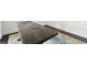 Close-up of dark wood table with visible wear at 36750 Us Highway 19 N # 04208, Palm Harbor, FL 34684