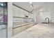 Modern kitchen with granite countertops and stainless steel appliances at 36750 Us Highway 19 N # 04208, Palm Harbor, FL 34684