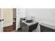 Bathroom with granite sink and dark tile floor at 36750 Us Highway 19 N # 04208, Palm Harbor, FL 34684