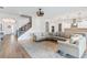 Large living room with sectional sofa and view to kitchen at 913 Buckhurst Dr, Spring Hill, FL 34609