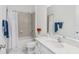 Bathroom with tub, shower, and updated vanity at 913 Buckhurst Dr, Spring Hill, FL 34609